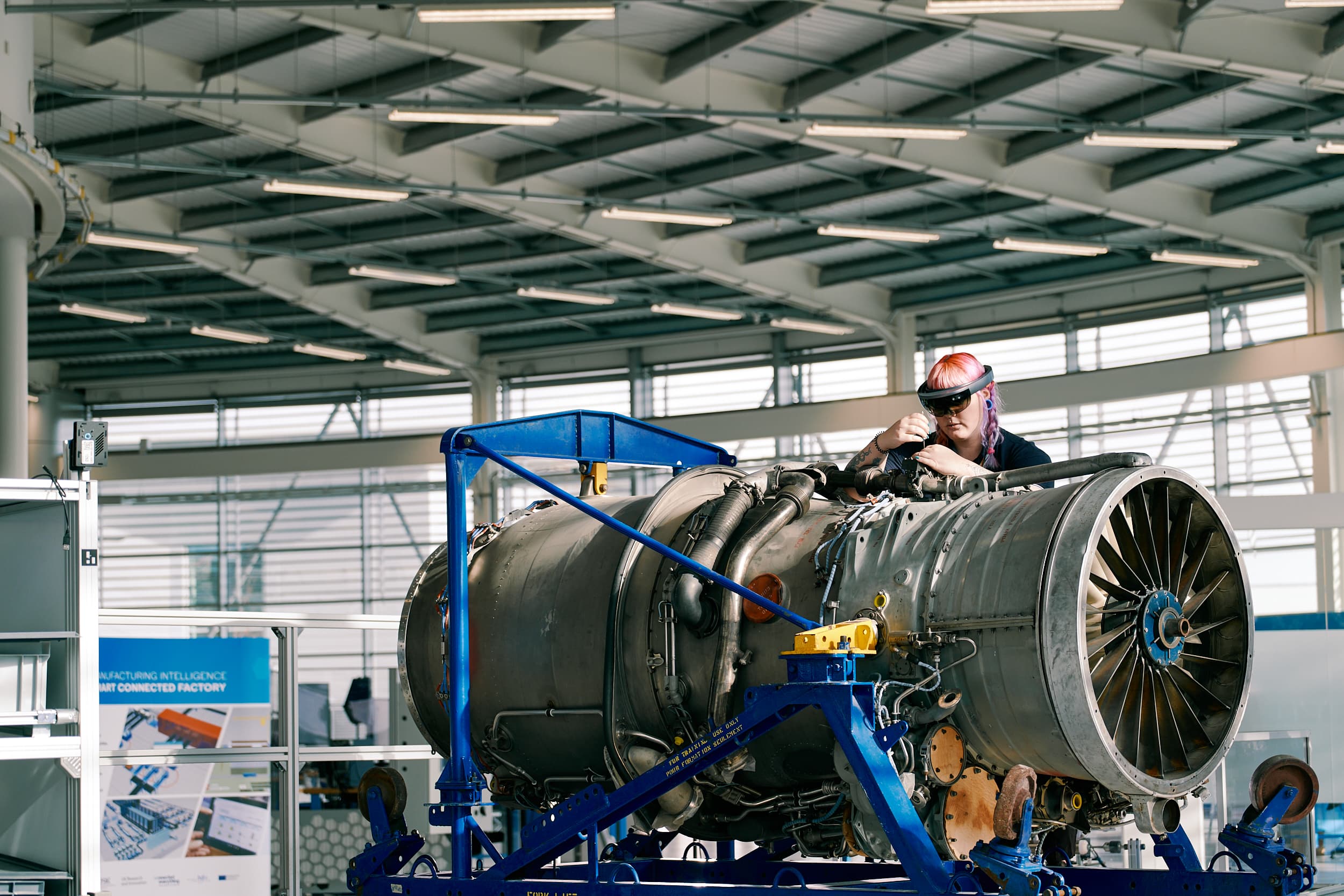 Large industrial turbine or engine component in a workshop